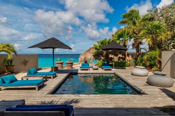 Welcome to oceanfront Villa Karibuni, a unique piece of Bonairian paradise designed by Piet Boon.