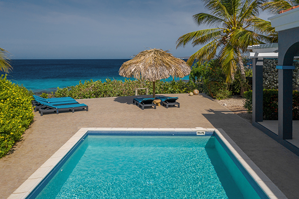 A beautiful 3 bedroom villa with easy beach access and a beautiful reef in front.
