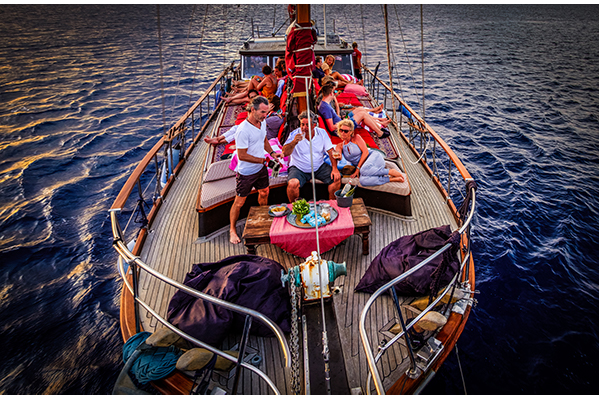 Enjoy the blue waters and a delicious 6 course dinner on the Melisa sailing