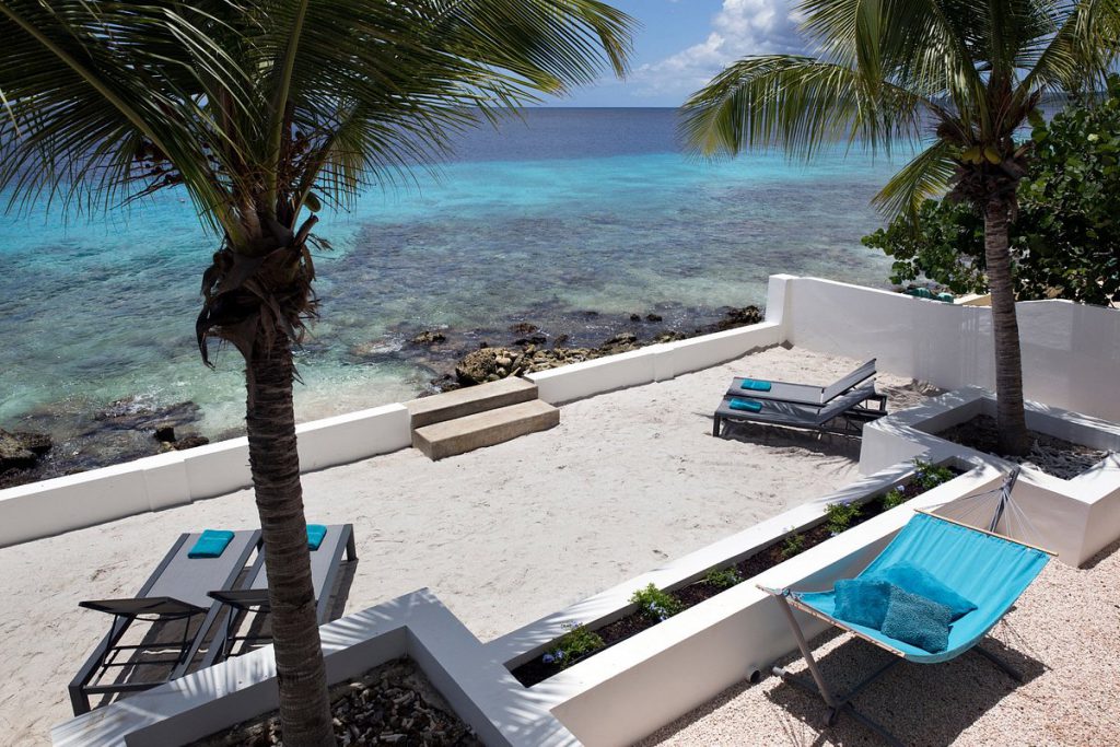 Te koop: een geweldige investeringsmogelijkheid op Bonaire - 4 sfeervolle luxe appartementen aan de Caribische Zee